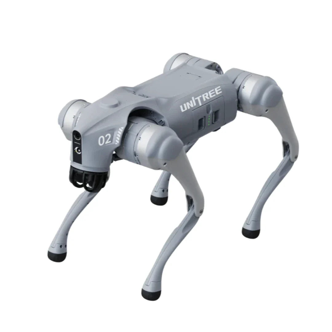 Sivi Unitree Go2 Air robotski pas u hodu pogled sprijeda na bijeloj podlozi
