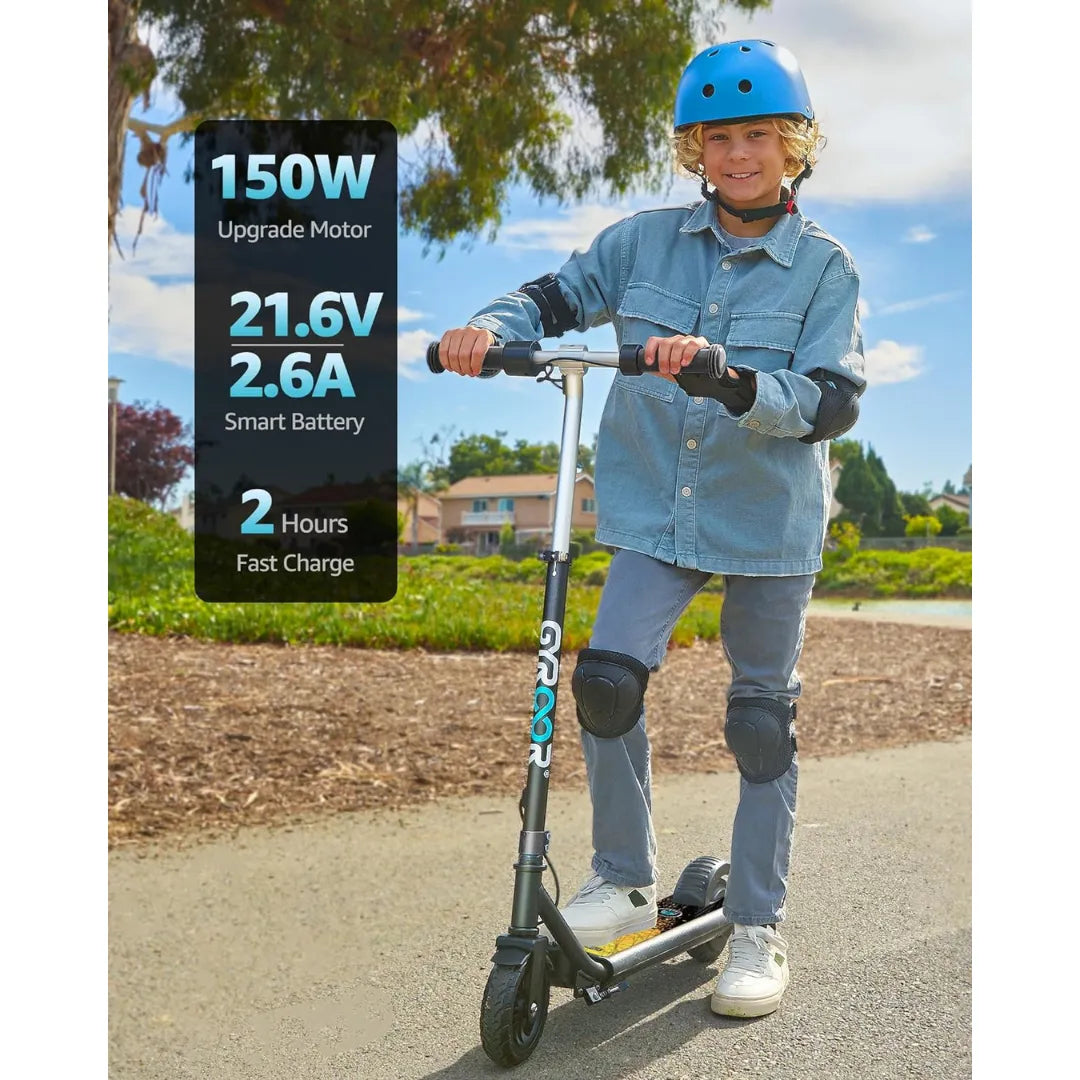 Dječji električni romobil Gyroor H30 Max s dječakom u zaštitnoj opremi na stazi