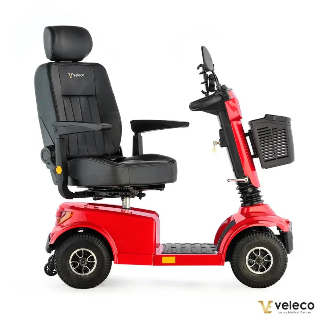 Crveni električni skuter za starije osobe Veleco Jumpy, bočni prikaz s crnim sjedalom i košarom