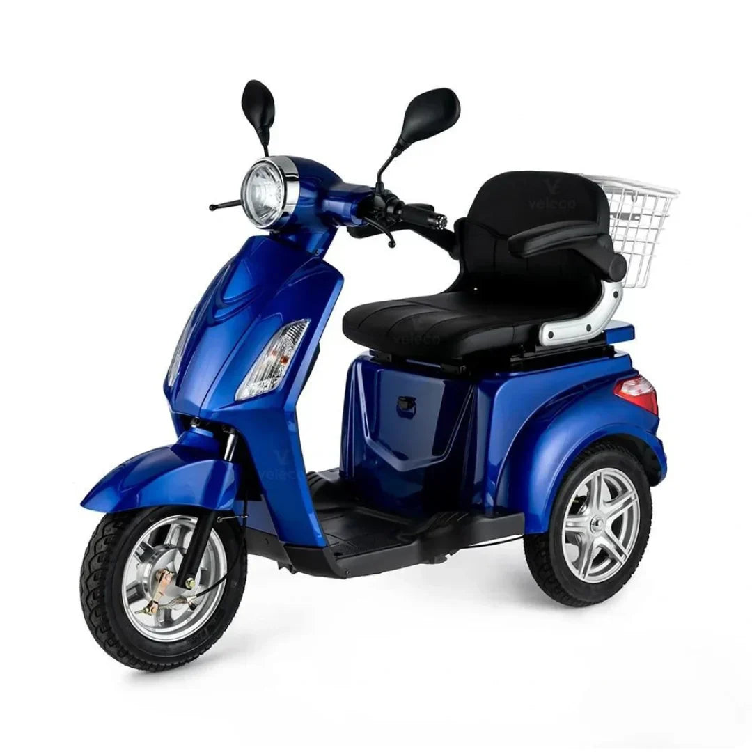 Plavi električni skuter Veleco ZT15 s tri kotača i stražnjom košarom, pogled sa strane