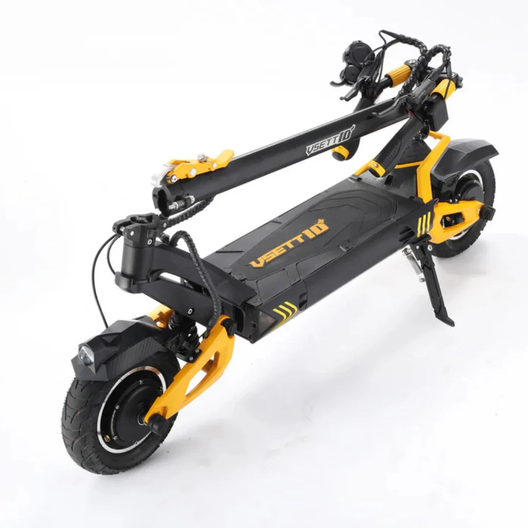 Sklopljeni električni romobil Vsett 10 Plus Super crno-žute boje iz povišenog kuta